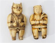 Zwei Netsuke, kleine Schnitzfiguren,  20. Jahrhundert. "Bauernpaar".