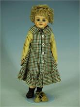 Puppe  um 1880. 